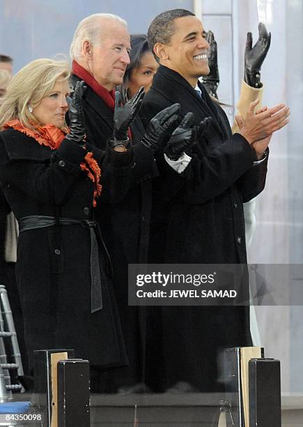 President-elect Barack Obama , vice president-elect Joe Biden as his wife Jill applaud during the 'We Are One" concert, one of the events of Obama's...