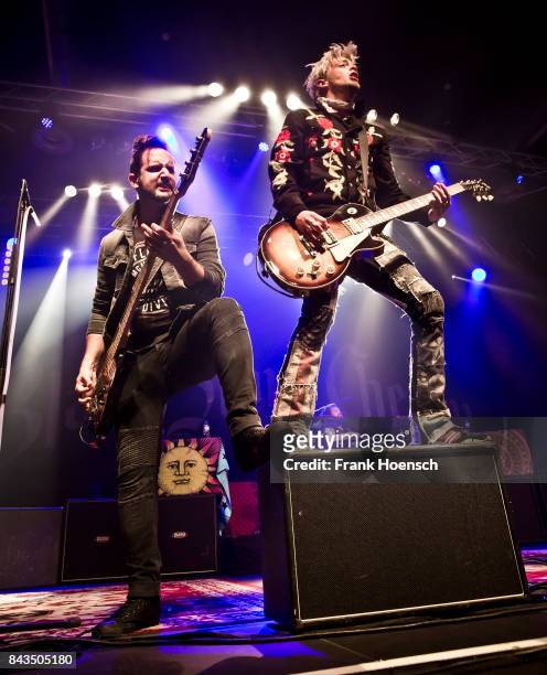 Jon Lawhon and Ben Wells of the American band Black Stone Cherry performs live on stage during a concert at the Huxleys on September 6, 2017 in...