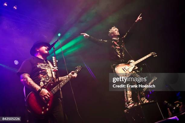 Chris Robertson and Ben Wells of the American band Black Stone Cherry performs live on stage during a concert at the Huxleys on September 6, 2017 in...