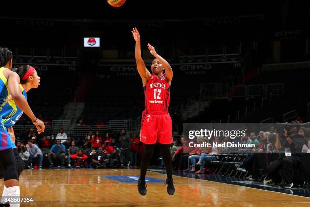 Ivory Latta of the Washington Mystics shoots the ball during the game against the Dallas Wings during Round One of the 2017 WNBA Playoffs on...