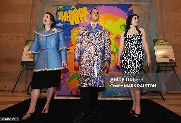 Environmentalist Nancy Judd poses with models showing dresses and a jacket made from recycled Presidential election campaign materials at the Green...