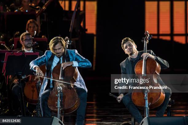Stjepan Glendale and Luka Sulic of 2Cellos performs at Luciano Pavarotti 10th Anniversary Concert in Arena di Verona on September 6, 2017 in Verona,...