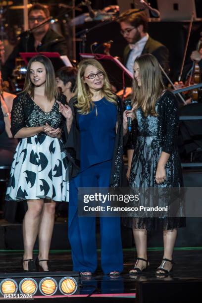 Maria Cristina Craciun, Nicoletta Mantovani and Alice Pavarotti perform at Luciano Pavarotti 10th Anniversary Concert in Arena di Verona on September...