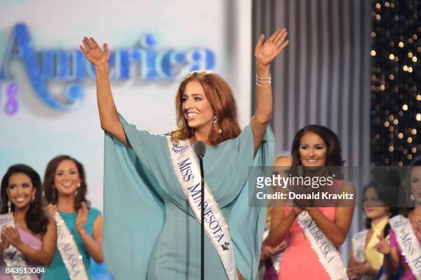 Miss Minnesota 2017 Brianna Drevlow enters the stage to participate in Miss America 2018 - First Night of Preliminary Competition at Boardwalk Hall...