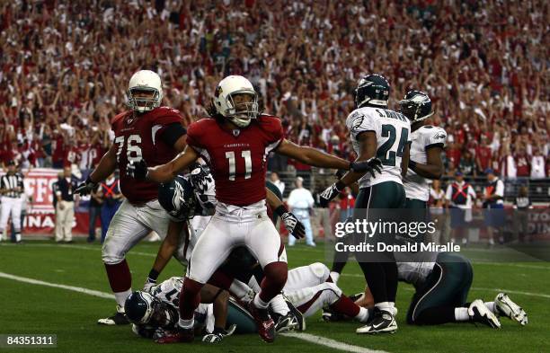 Wide Receiver Larry Fitzgerald of the Arizona Cardinals celebrates the Cardinals' final touchdown against the Philadelphia Eagles during the NFC...