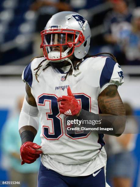 Running back Brandon Bolden of the New England Patriots runs off the field prior to a preseason game on August 25, 2017 against the Detroit Lions at...