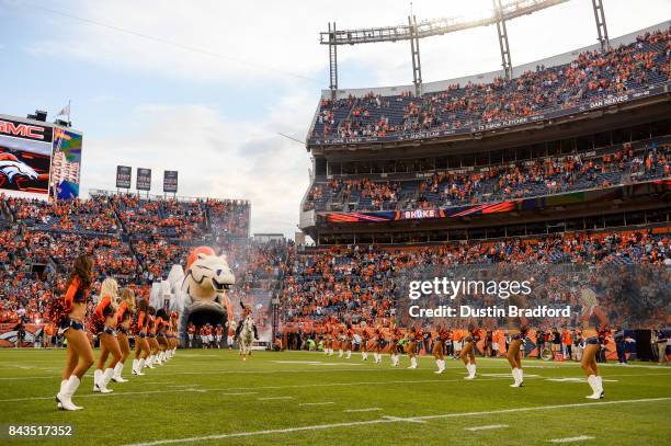 Thunder and Ann Judge-Wegener lead the Denver Broncos onto the field before a Preseason game before a preseason NFL game between the Denver Broncos...