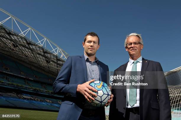 Former Socceroo Brett Emerton and FFA CEO David Gallop pose during an FFA Socceroos announcement at ANZ Stadium on September 7, 2017 in Sydney,...