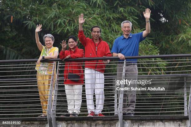 Indonesian President Joko Widodo and wife, Iriana and Singapore Prime Minister, Lee Hsien Loong and wife, Ho Ching pose for a photo at The Learning...