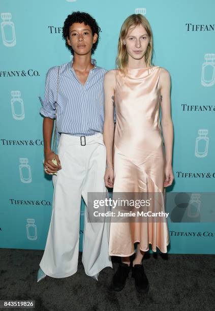 Models Dilone and Julia Nobis attend the Tiffany & Co. Fragrance launch event on September 6, 2017 in New York City.