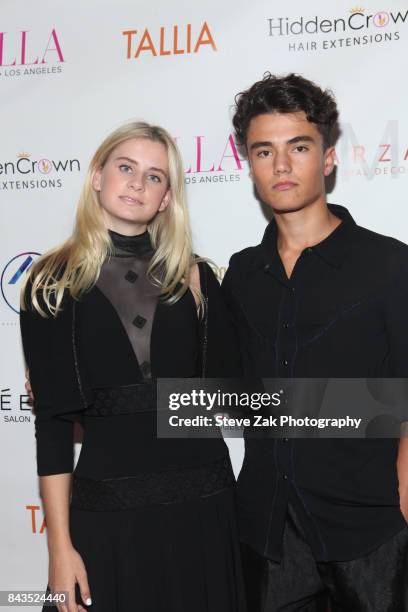 Mason Grammer and Dylan Grieco attends Bella Magazine NYFW Kickoff Party at The Attic Rooftop Lounge on September 6, 2017 in New York City.