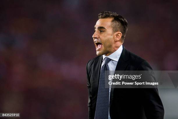 Guangzhou Evergrande head coach Fabio Cannavaro reacts during the AFC Champions League 2015 Group Stage H match between Guangzhou Evergrande vs...