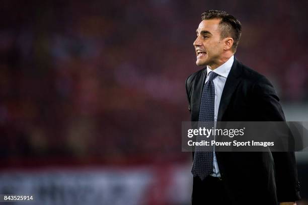 Guangzhou Evergrande head coach Fabio Cannavaro reacts during the AFC Champions League 2015 Group Stage H match between Guangzhou Evergrande vs...