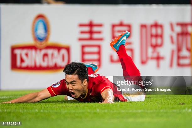 Guangzhou Evergrande midfielder Zhao Xuri celebrates after scoring his goal during the AFC Champions League 2015 Group Stage H match between...
