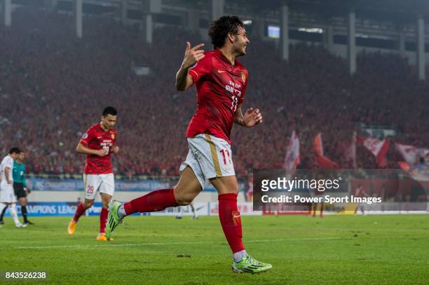 Guangzhou Evergrande midfielder Goulart Pereira celebrates after scoring his goal during the AFC Champions League 2015 Group Stage H match between...