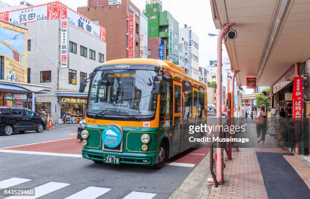 cute shuttle bus in kappabashi kitchenware street - shuttle bus stock pictures, royalty-free photos & images