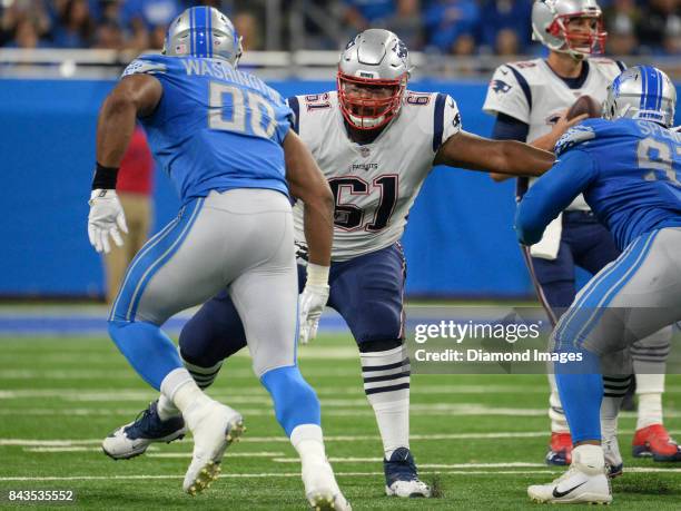 Right tackle Marcus Cannon of the New England Patriots prepares to engage defensive end Cornelius Washington of the Detroit Lions in the first...