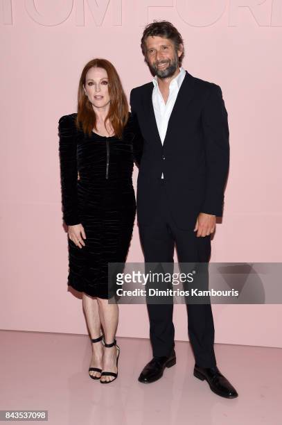 Julianne Moore and Bart Freundlich attend the Tom Ford Spring/Summer 2018 Runway Show at Park Avenue Armory on September 6, 2017 in New York City.