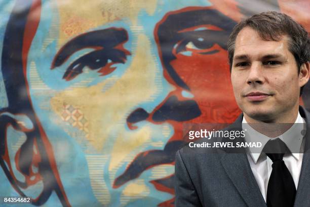 Artist Shepard Fairey unveils his portrait of US President-elect Barack Obama before it was installed at the National Portrait Gallery in Washington...