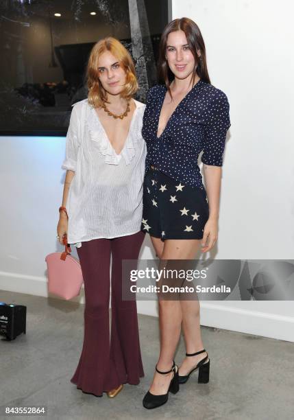 Tallulah Belle Willis, Scout LaRue Willis and celebrity floral and fragrance designer Eric Buterbaugh attend the private opening of Sascha von...