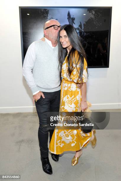 Celebrity floral and fragrance designer Eric Buterbaugh and Demi Moore attend the private opening of Sascha von Bismarck debut photography...