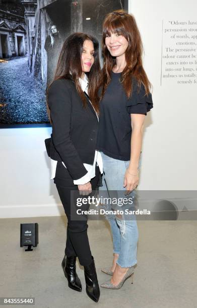 Loree Rodkin, Lucila Sola and celebrity floral and fragrance designer Eric Buterbaugh attend the private opening of Sascha von Bismarck debut...