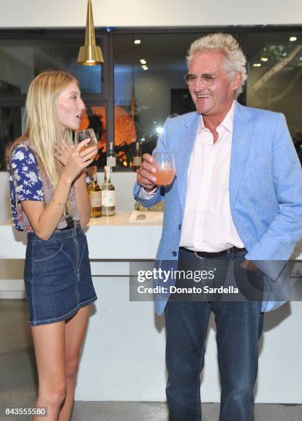 Ella Richards, Leopold von Bismarck and celebrity floral and fragrance designer Eric Buterbaugh attend the private opening of Sascha von Bismarck...