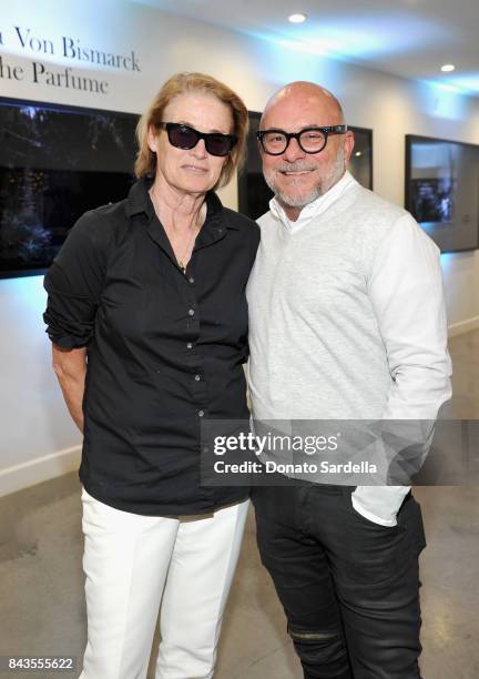 Lisa Love and celebrity floral and fragrance designer Eric Buterbaugh attend the private opening of Sascha von Bismarck debut photography collection,...