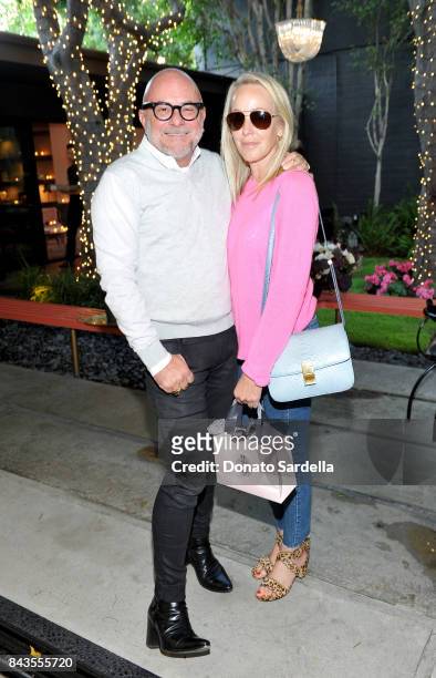 Celebrity floral and fragrance designer Eric Buterbaugh and Julie Jaffe attend the private opening of Sascha von Bismarck debut photography...
