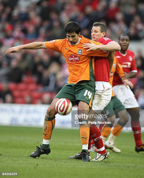 Rory Fallon of Plymouth Argyle attempts to control the ball under pressure from Ian Breckin of Nottingham Forest during the Coca Cola Championship...