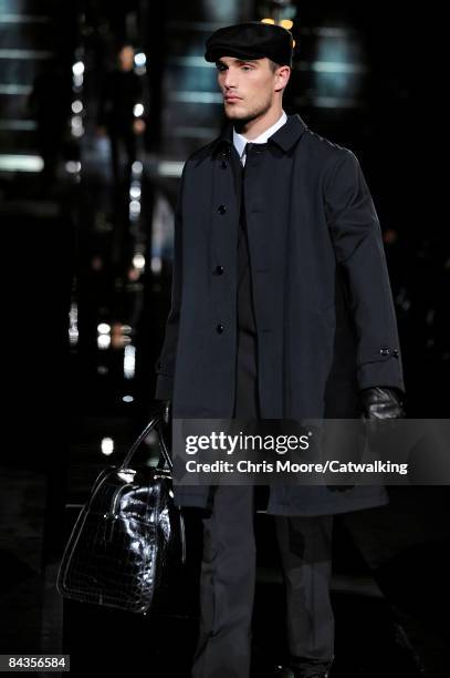 Model walks the runway during the Dolce & Gabbana show part of Milan Fashion Week Autumn/Winter 2009 Menswear on January 17, 2009 in Milan, Italy