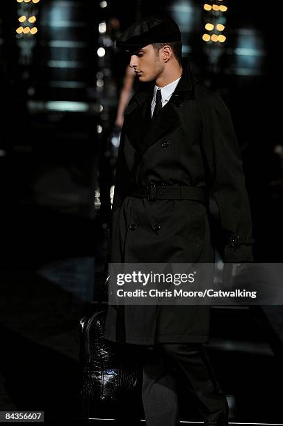 Model walks the runway during the Dolce & Gabbana show part of Milan Fashion Week Autumn/Winter 2009 Menswear on January 17, 2009 in Milan, Italy