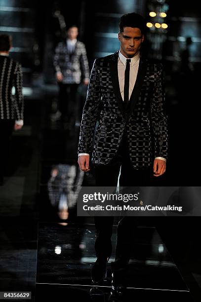 Model walks the runway during the Dolce & Gabbana show part of Milan Fashion Week Autumn/Winter 2009 Menswear on January 17, 2009 in Milan, Italy