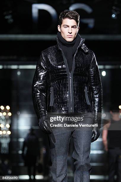 Model walks the runway during the Dolce & Gabbana show as part of Milan Fashion Week Autumn/Winter 2009/10 Menswear on January 17, 2009 in Milan,...