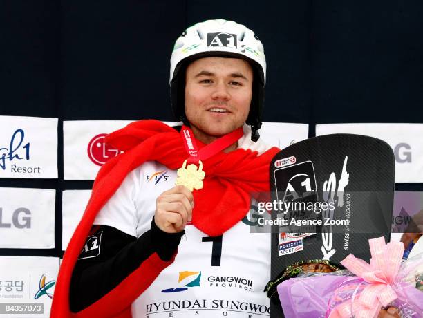 Markus Schairer of Austria celebrates his 1st Place during Men's Boardercross event at the Snowboard FIS World Championships on January 19, 2009 in...