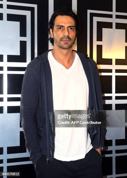 Indian Bollywood actor Arjun Rampal attends a screening of his political crime drama Hindi film "Daddy" in Mumbai on September 6, 2017. A movie about...