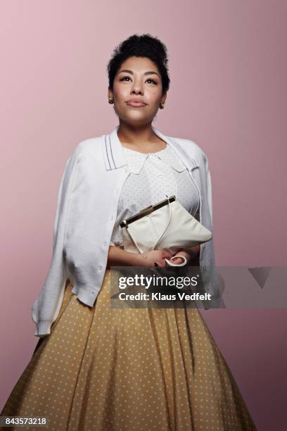 cool young woman looking up in the light - vintage 1950s woman stock pictures, royalty-free photos & images