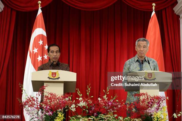 Indonesian President Joko Widodo and Singapore Prime Minister, Lee Hsien Loong attend the Joint Press Conference at the Istana on September 7, 2017...