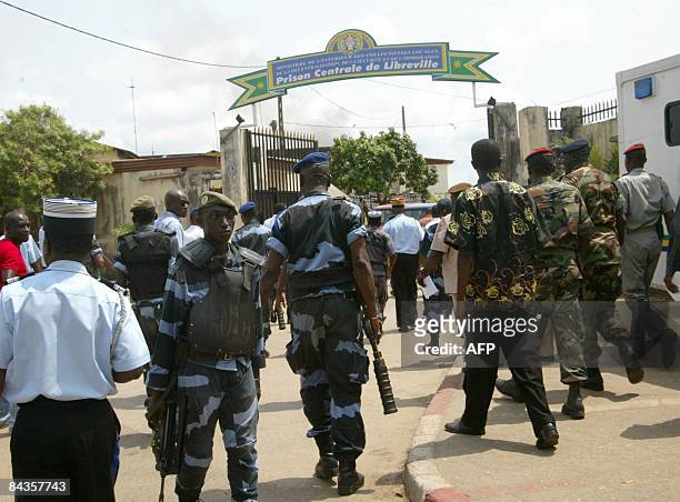 Officers from the paramilitary gendarme force enter the Libreville prison on January 19, 2009 where inmates took warders and female prisoners...