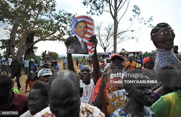 Villagers of Nyang'oma in Kogelo sing and dance to welcome tourists on January 19, 2009 during festivities on the eve of the inauguration of Barack...