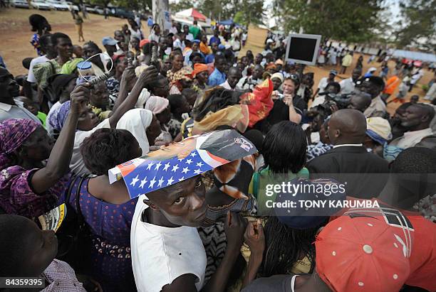 Villagers of Nyang'oma in Kogelo sing and dance to welcome tourists on January 19, 2009 during festivities on the eve of the inauguration of Barack...