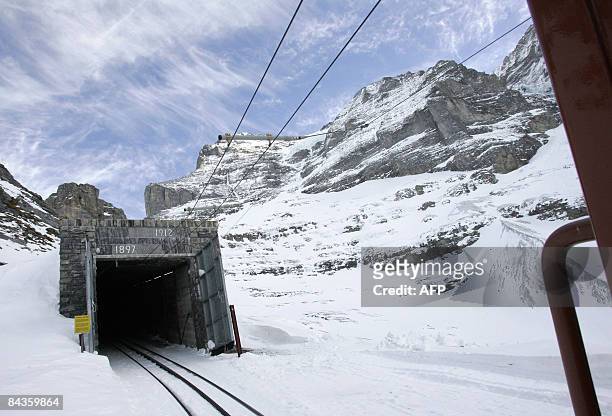 The entrance of the 7.3km long railway tunnel that brings tourists to the highest railway station in Europe, Jungfraujoch at an altitude of 3454...
