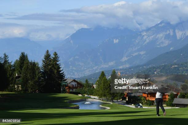 Lee Westwood of England tees off on the 14th during day one of the 2017 Omega European Masters at Crans-sur-Sierre Golf Club on September 7, 2017 in...
