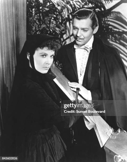 British actress Vivien Leigh and Clark Gable on the set of 'Gone with the Wind', based on the novel by Margaret Mitchell and directed by Victor...