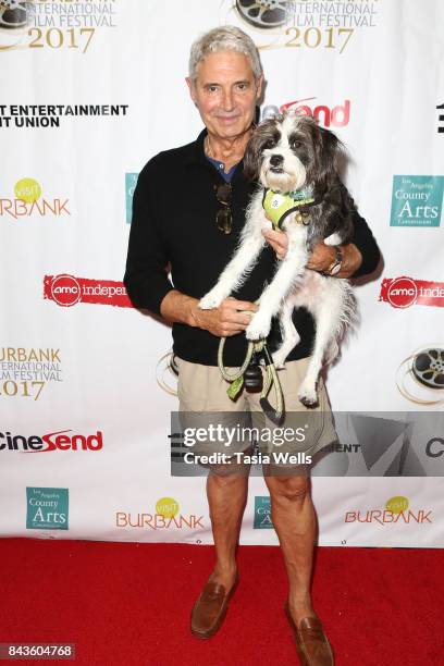 Michael Nouri with dog Charlie Nouri at the opening night of the 9th Annual Burbank International Film Festival - "The List" at AMC Burbank 16 on...