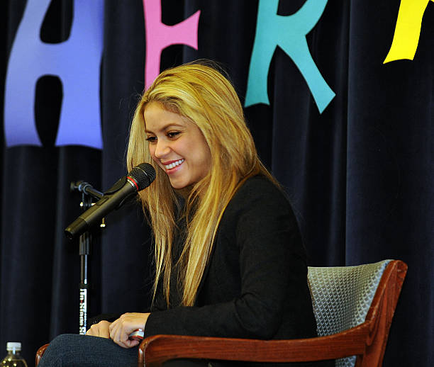 Colombian pop star Shakira reads to children at Oyster-Adams Bilingual Elementry School in Washington on January 19, 2009 where she announced a...