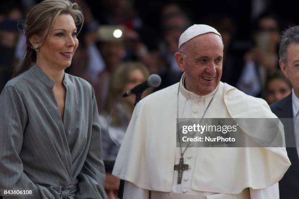 Pope Francis is welcomed by Colombian President Juan Manuel Santos and first lady Maria Clemencia Rodriguez in the visit to Colombia on September 06,...