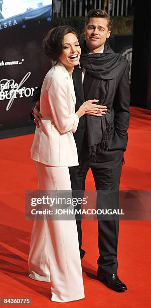 Actors Brad Pitt and Angelina Jolie pose on the red carpet for the German premiere of the film �The Curious Case of Benjamin Button� by US director...