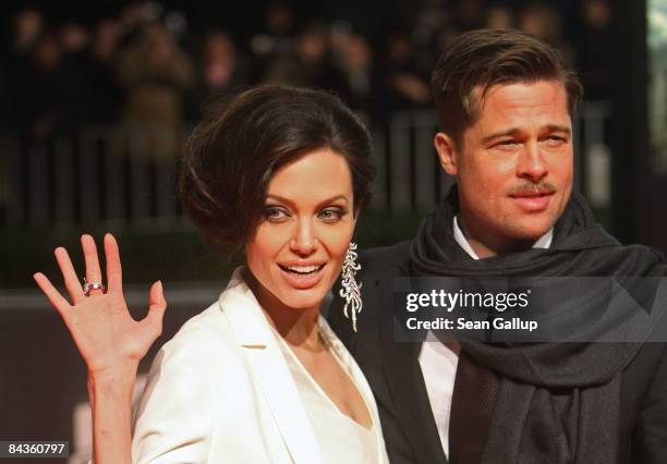 Actor Brad Pitt and actress Angelina Jolie arrive for the German premiere of "The Curious Case of Benjamin Button" at the Sony Center CineStar on...