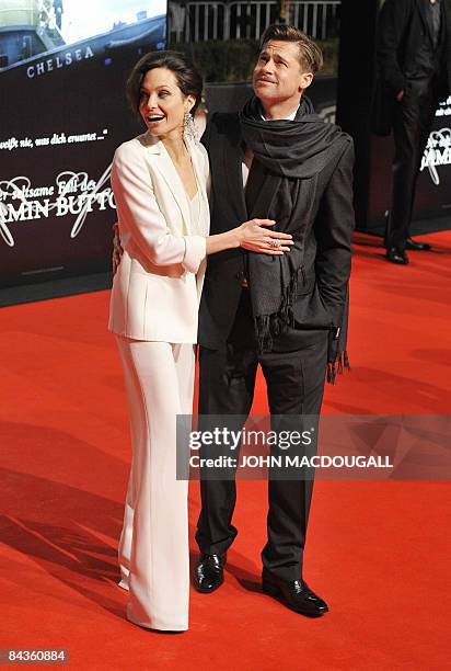 Actors Brad Pitt and Angelina Jolie pose on the red carpet for the German premiere of the film �The Curious Case of Benjamin Button� by US director...